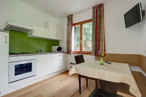 Soggiorno con angolo cucina